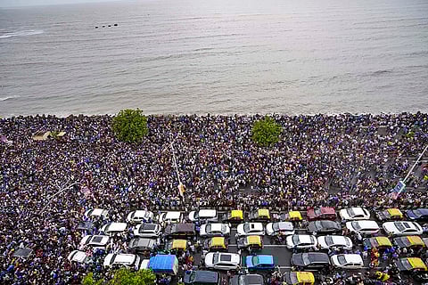 Fans gather outside the Wankhede Stadium